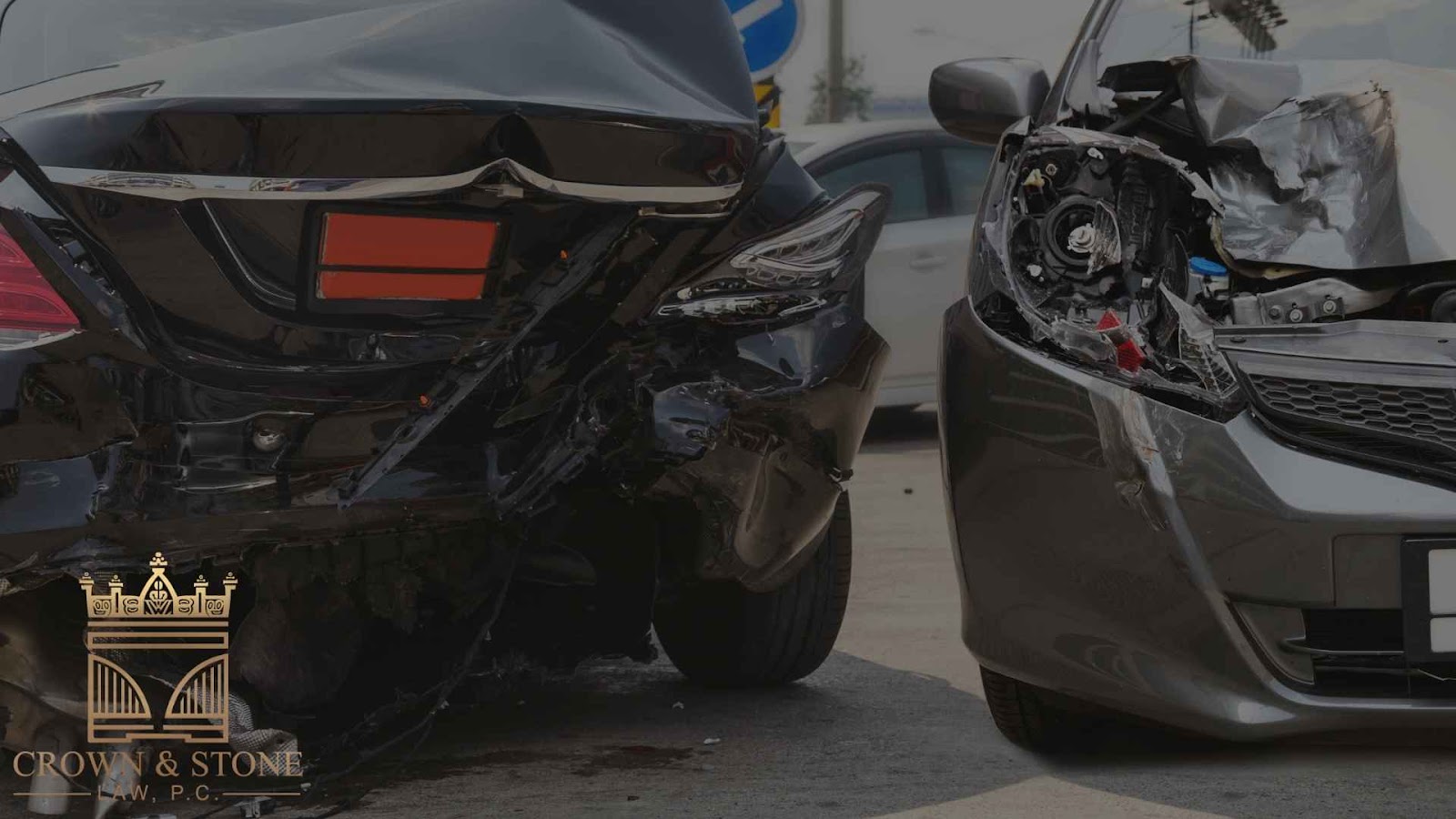 Two heavily damaged cars after collision.