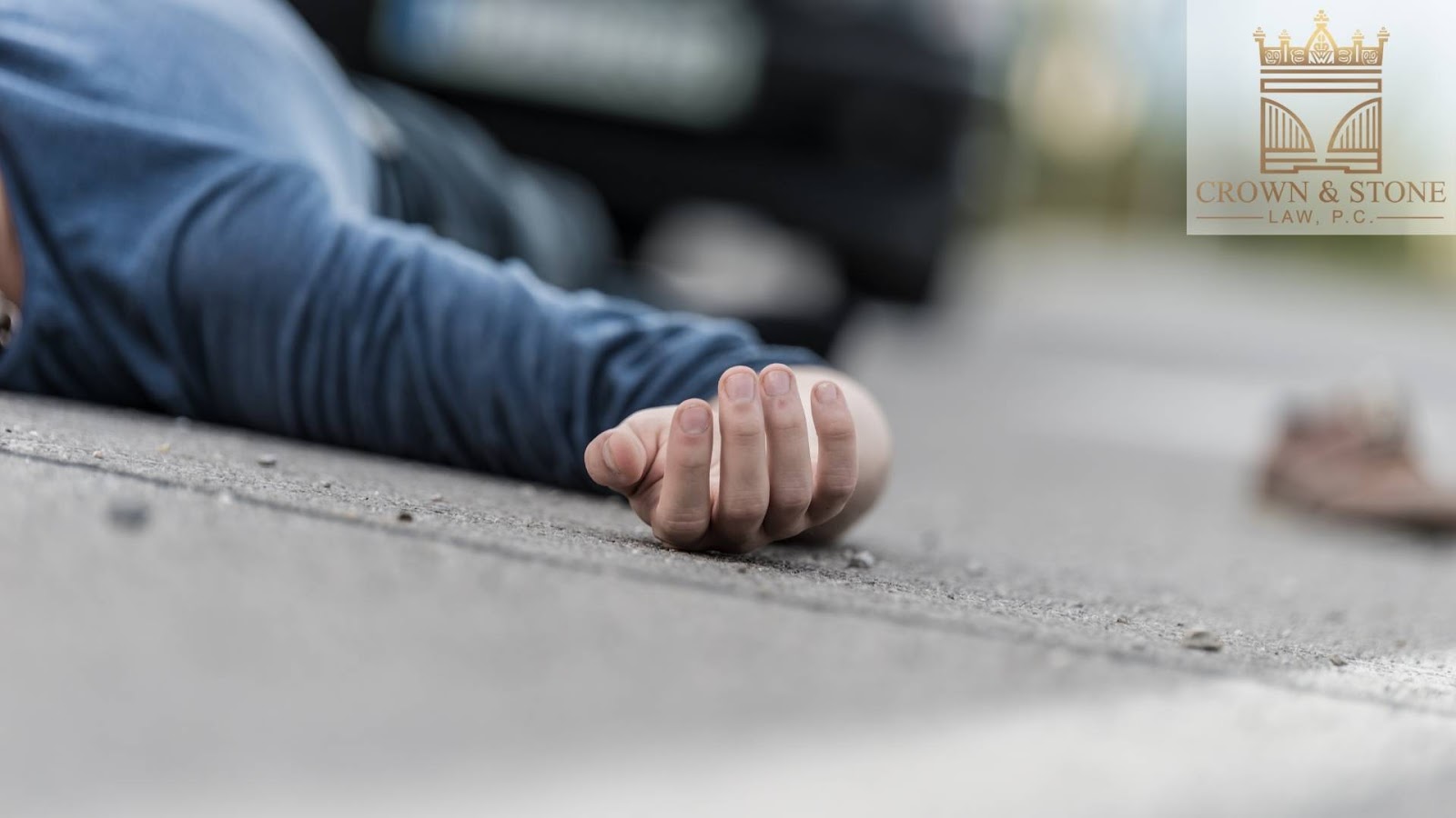 Person lying on the road, accident scene.