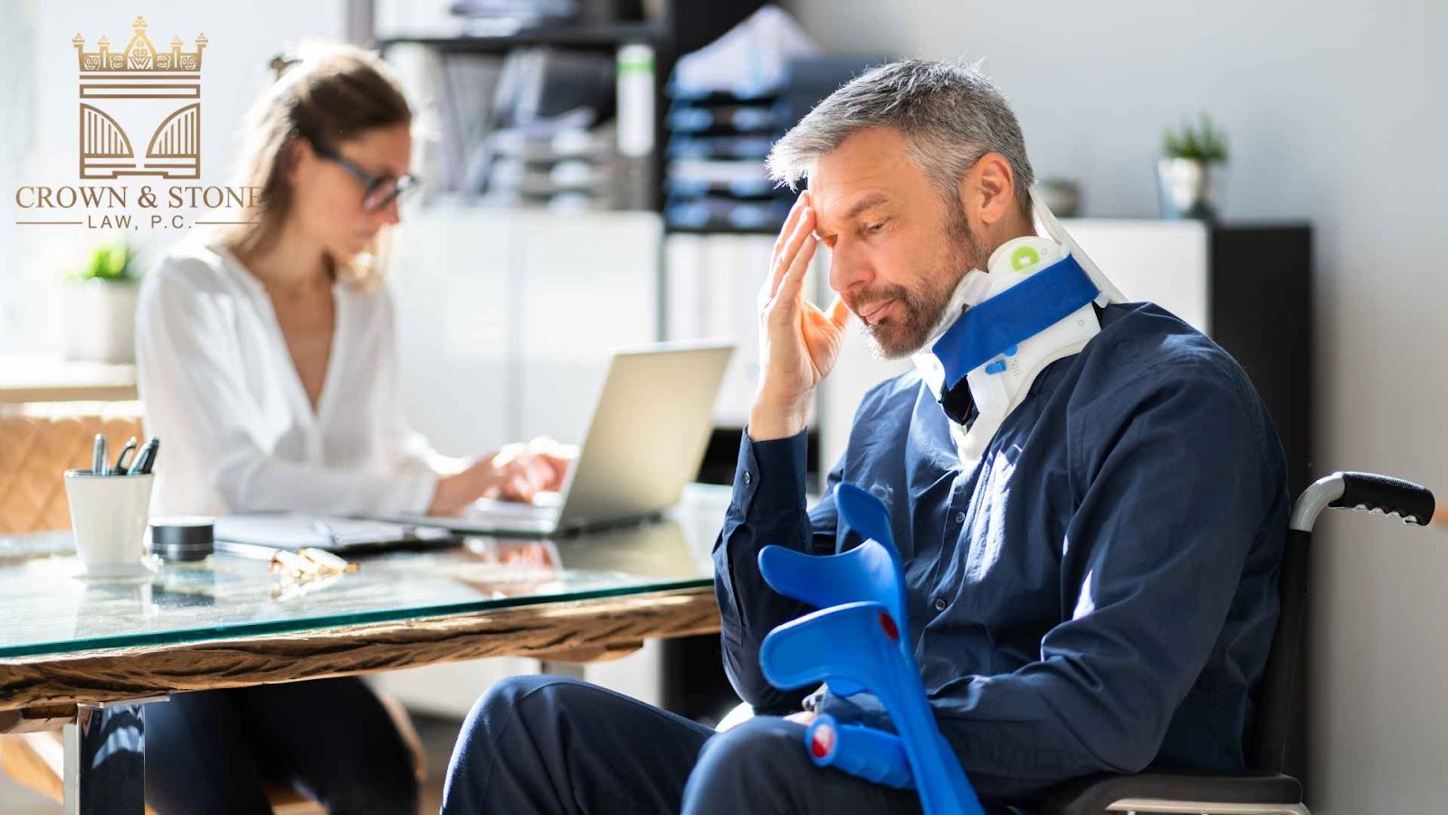 Injured man with neck brace in lawyer's office.