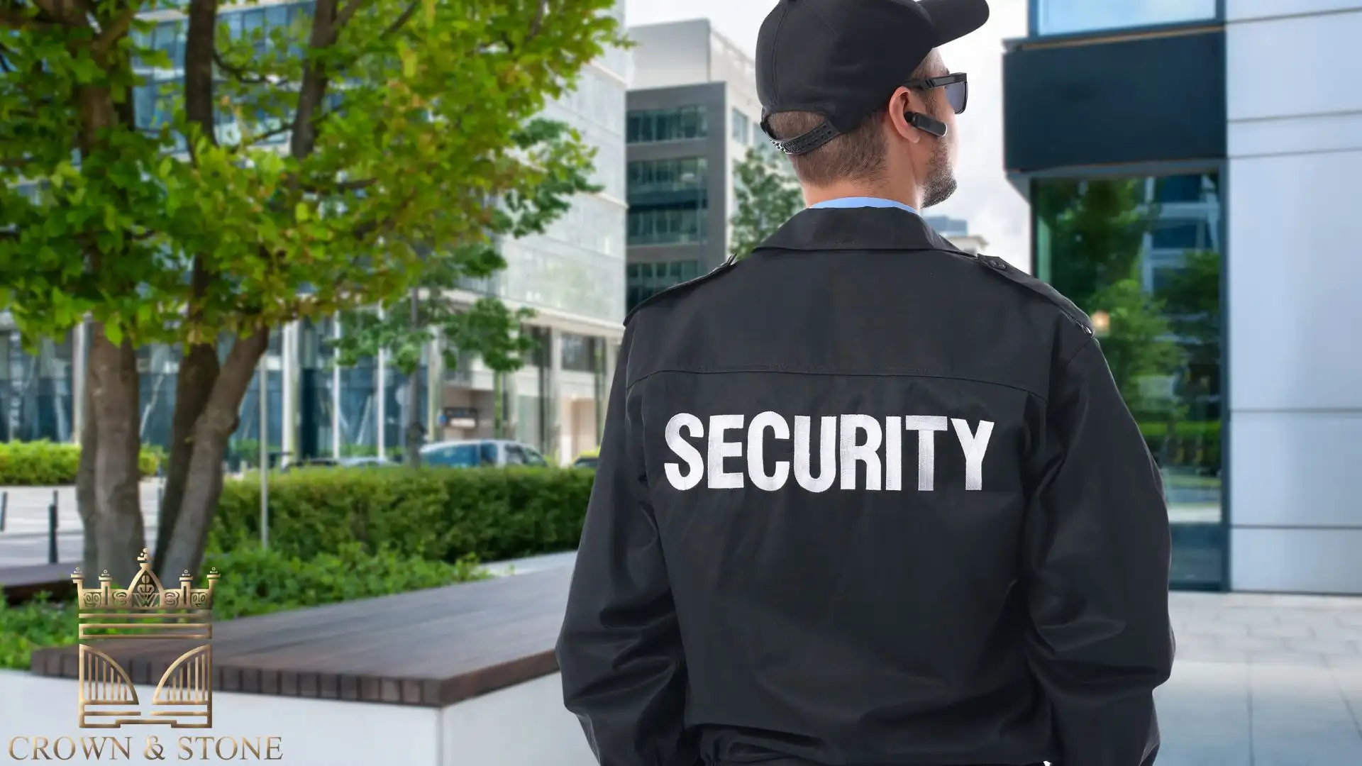 Security guard outside modern building
