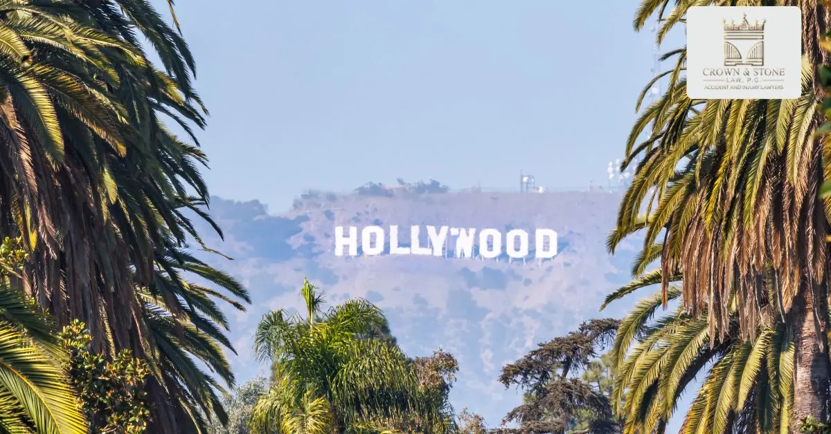 Hollywood sign framed by palm trees in Los Angeles