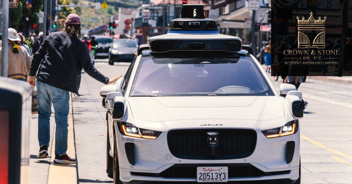 A driverless car with roof sensors on a city street, the likely scene for a Waymo crash injury claim in Los Angeles. Branded with the Crown & Stone Law, P.C. logo.